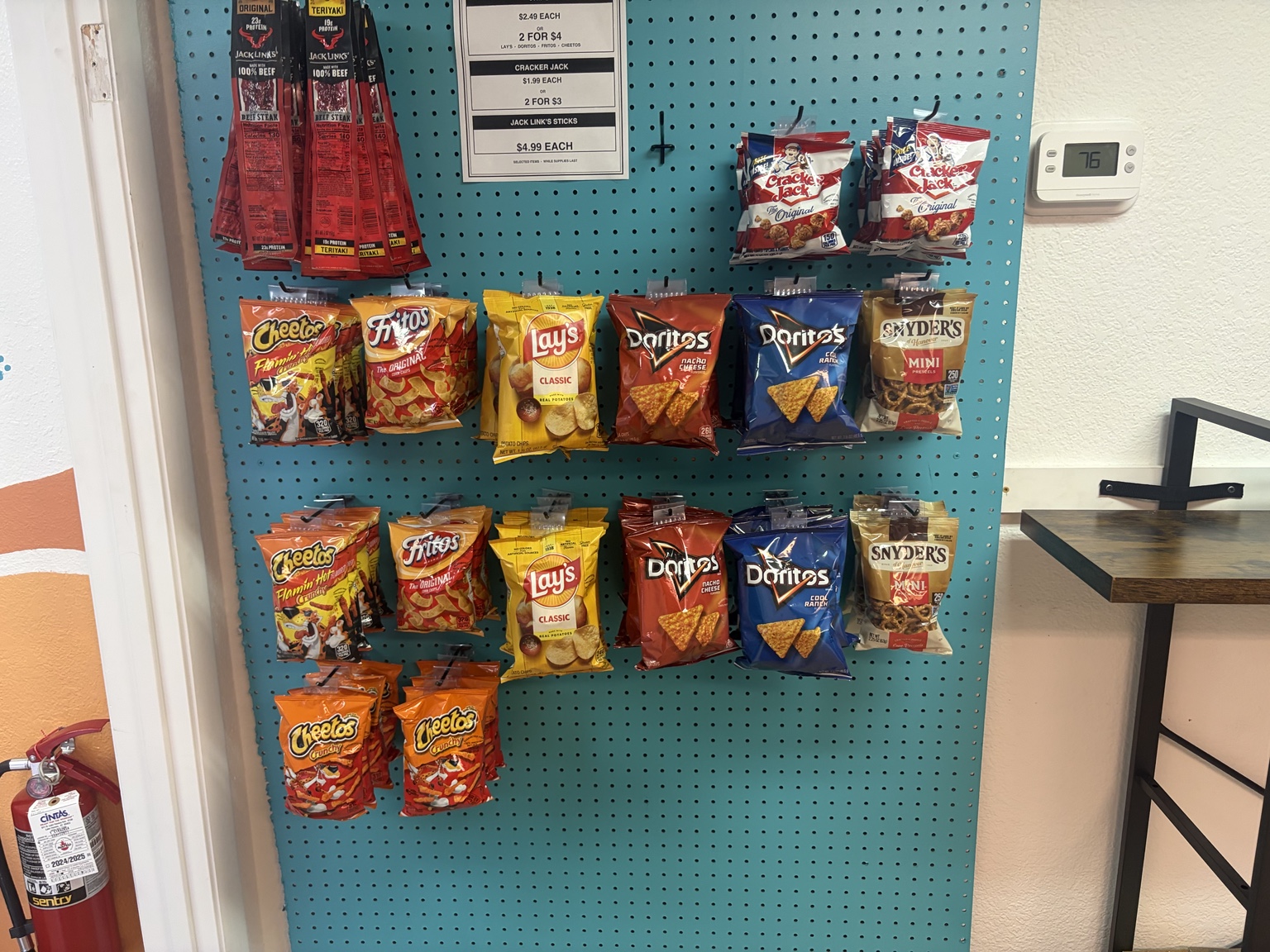 Chips and salty snacks on the store shelf